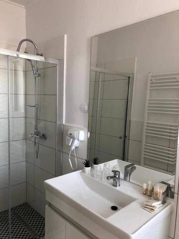 Фото номера Апартаменты с 2 спальнями Отель ALPIN rooms г. Топлица 3